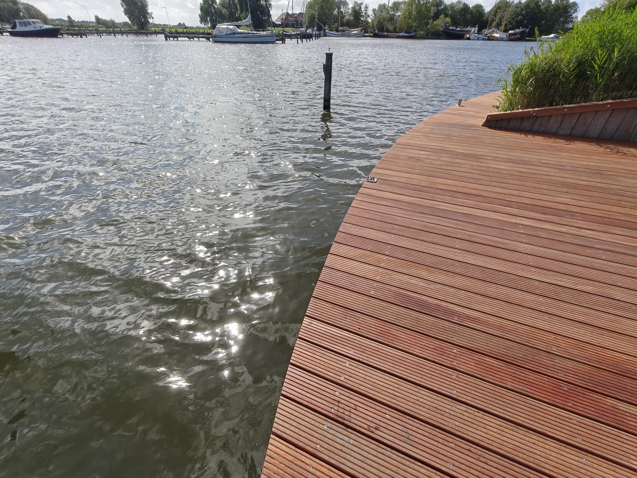 Vlonder vernieuwd aan het water — foto 12